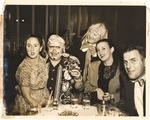 Portrait of group drinking with some in costumes